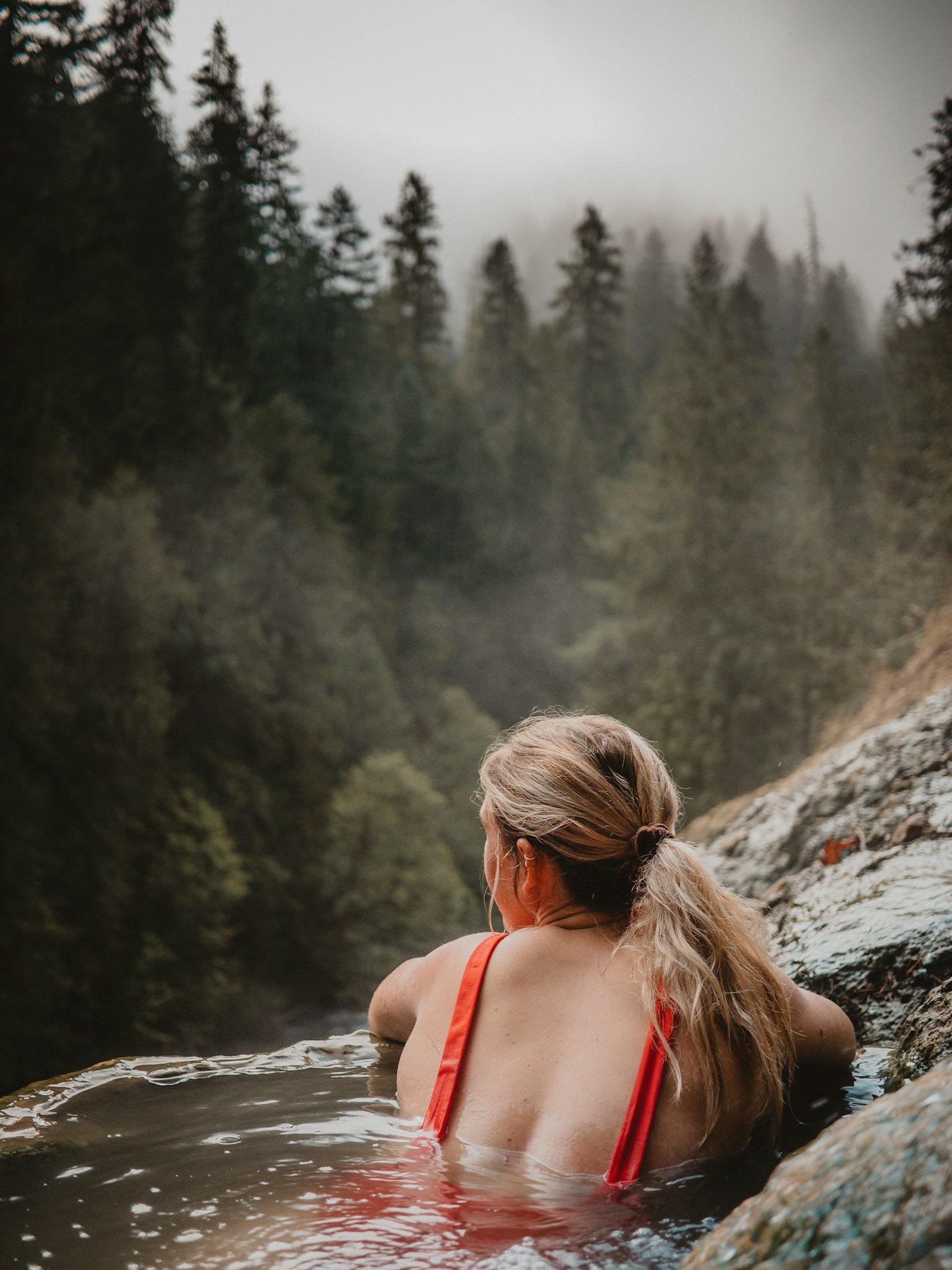 A restorative soak surrounded by mountain landscape