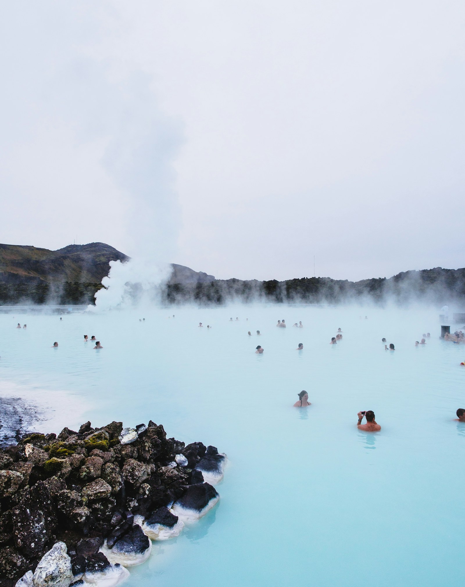 Steam rising from a mineral-rich outdoor pool