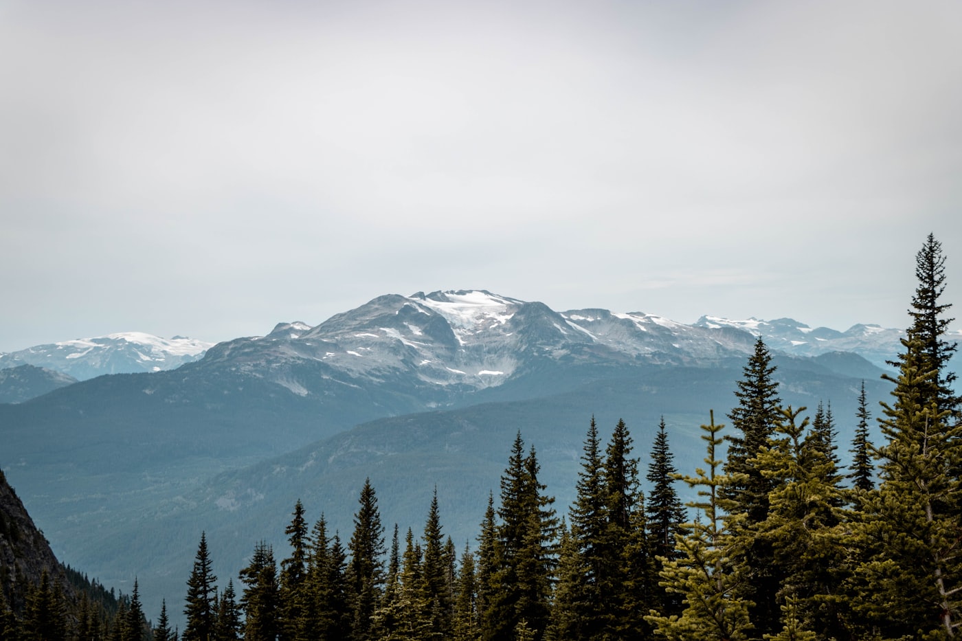 Snow-covered national-park terrain beneath a clear winter sky